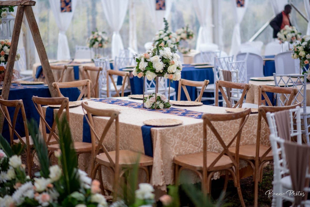 Koito tables set in navy and gold with wooden chairs