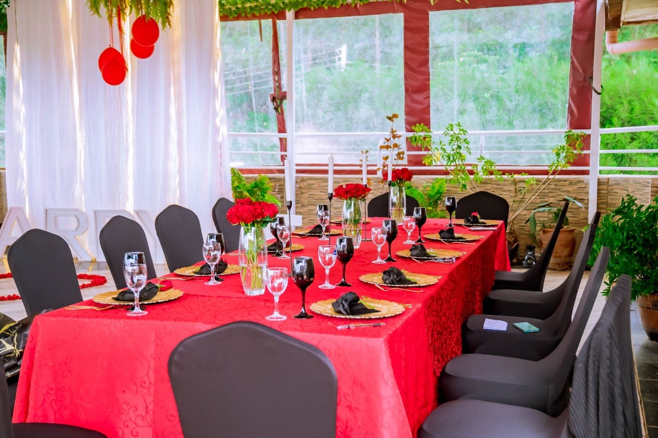 A long table set in red and black